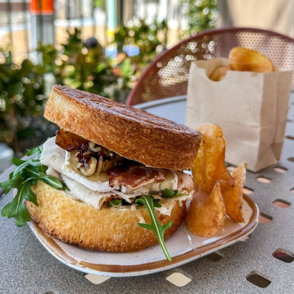 New Disney World Food Amorette's Patisserie Turkey and Brie Croissant Sandwich